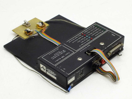 AMG Test Engineering 500 ResBox – rear three-quarter view showing D-Sub control interface connector on right side of main unit and head fixture board with trimmers