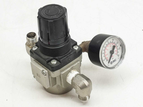 SMC AR30-N03-Z air pressure regulator front-right view with attached SMC pressure gauge and NPT fittings
