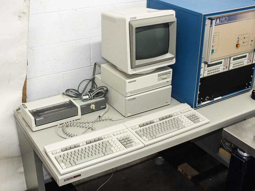 HP 9000 300 Series workstation with CRT monitor, HP 9153C disk drive, HP Thinkjet printer, and keyboard — close-up view of computer station