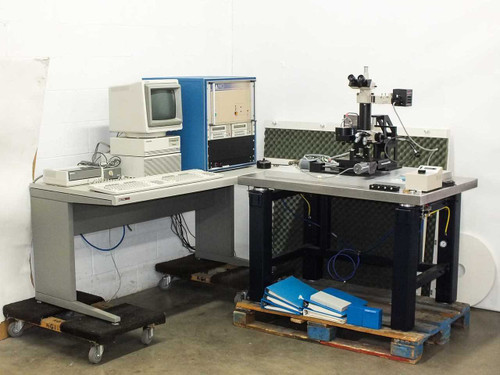 Nano Instruments Nanoindenter system overview — full lab setup showing control cabinet, HP 9000 workstation desk, and indenter microscope stage on isolation table