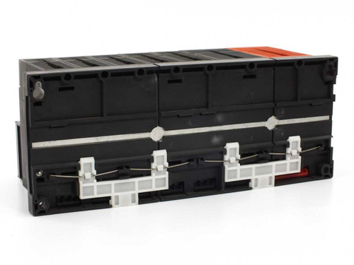 Mitsubishi Melsec PLC system – bottom/rear view showing module connectors and backplane wiring clips