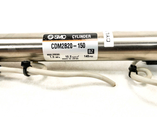 SMC CDM2B20-150 cylinder label showing model number, max pressure 1.0 MPa, 10.2 kgf/cm², 145 PSI, Made in Japan