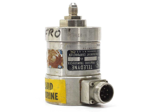 Teledyne Taber 206-SA pressure transducer front view showing label, multi-pin side connector, and yellow warning sticker