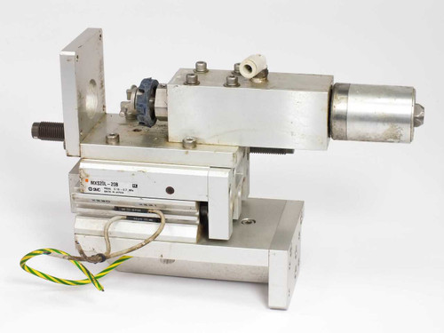 SMC MXS20L-20B Pneumatic Air Slide Table — three-quarter front view showing full assembly with cylinder, mounting bracket, and ground wire