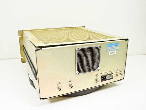 Hughes 3878529-100 Station Status and Control Module – rear/side view showing ventilation fan, AC inlet, BNC connectors, and blue Hughes label