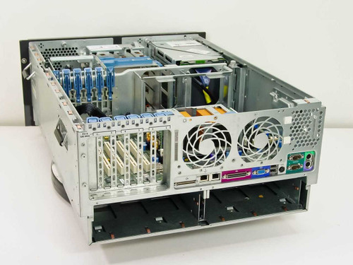 HP ProLiant ML370 interior side view showing expansion cards, dual cooling fans, rear I/O ports, and empty hot-swap drive bays