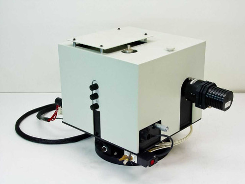 Oriel 150W arc lamp housing enclosure — left-side view showing white sheet-metal housing, cable exits, and black rotary base