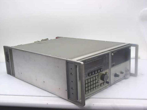 Eaton 380K11 Synthesized Signal Generator — three-quarter front view showing benchtop rackmount chassis, front panel controls, and carry handles