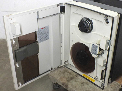 Fujitsu M2444AC tape drive – door open showing take-up reel hub and supply reel assembly inside Wiltec cabinet