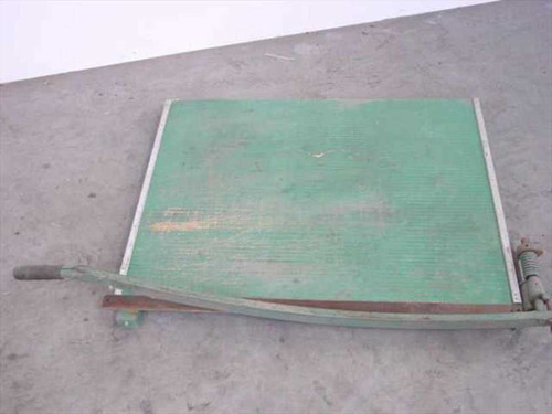 Photo Materials Co. Premier 30-inch guillotine paper cutter — top-down view showing green cutting mat and swing arm blade handle
