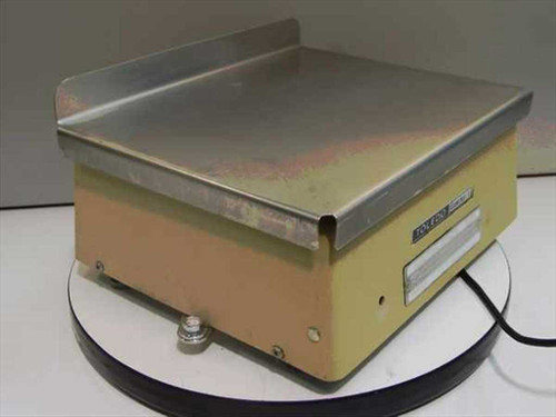 Toledo 8211 Guardian V Scale – front-right three-quarter view showing stainless steel platter and yellow housing with power cord