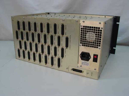 Astrocom 4100 Multiplexer rear panel showing 32 DB-25 RS-232 ports, large Mux connector, IEC power inlet, power switch, and cooling fan