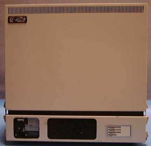 Octel Aspen Branch XP Voice Mail System – front view showing beige enclosure, ventilation slots, AC power inlet at lower left, and component label at lower right