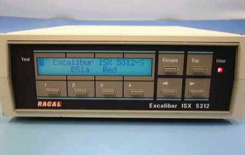 Racal Excalibur ISX 5312 front panel close-up showing LCD screen reading 'Excalibur ISX 5312-5 DSla Red' with labeled channel and control buttons