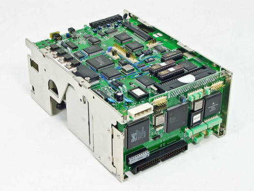 Fujitsu M2651SA SCSI hard drive — angled side view showing PCB with SCSI interface connector, large controller chips, and drive chassis