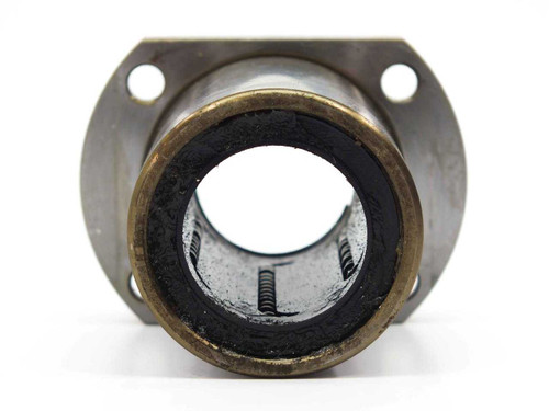 NB SMT25GUU Two Side Cut Flange Slide Bush — front view showing 25mm bore opening and rubber seal ring