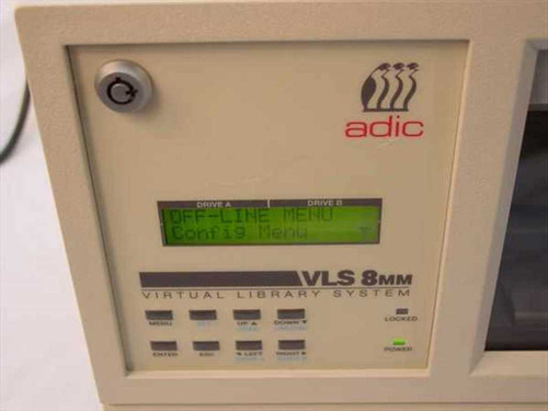 ADIC VLS-8MM front panel close-up showing LCD display with Drive A and Drive B menus, navigation buttons, and VLS 8MM Virtual Library System label