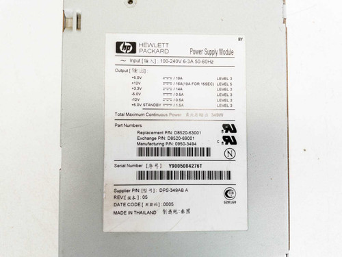 HP D8520-63001 power supply label showing part numbers, input/output specs, and serial number