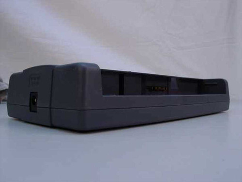Toshiba PA2508U external battery charger cradle – rear and side view showing battery slot and connector