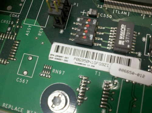 Compaq 283957-001 label close-up showing part number 283957-001 and secondary number 006651-000, assembled in USA