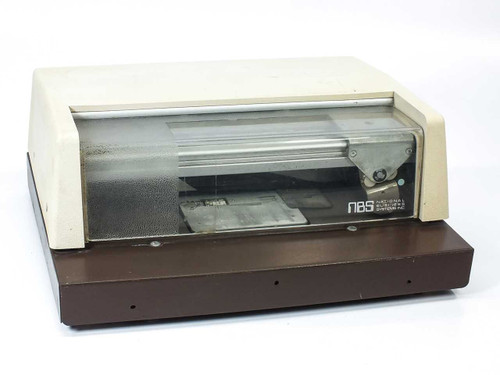 National Business Systems NBS Model 306 card imprinter – front three-quarter view showing clear plastic cover and imprint carriage