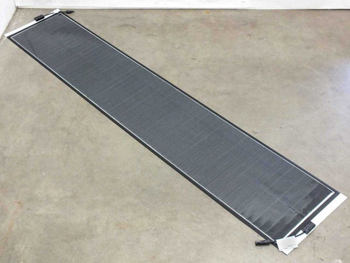 SoloPower SP1-75 75W flexible thin-film solar panel laid flat on the floor showing full 7-foot length