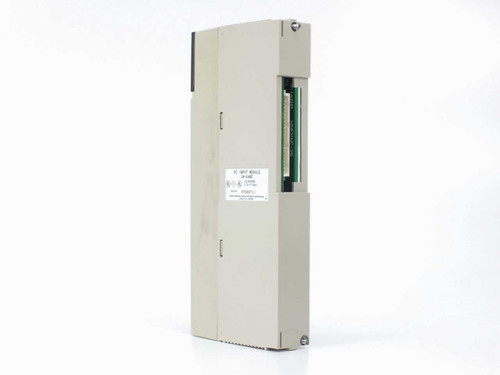 Sharp JW-64NC DC Input Module – right-side view showing label with DC Input Module designation and module body