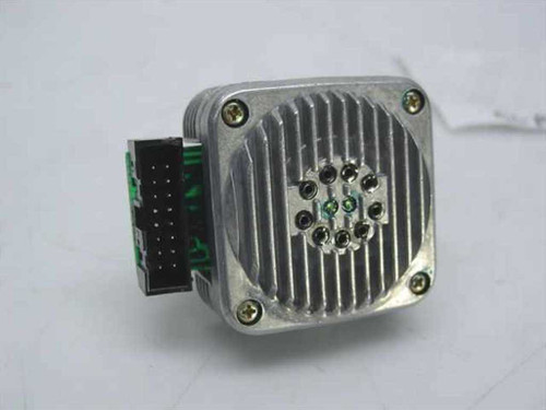 Alps P2000G printhead rear view showing ribbed aluminum heat-sink housing and 9-pin wire guide array, green PCB connector on left side