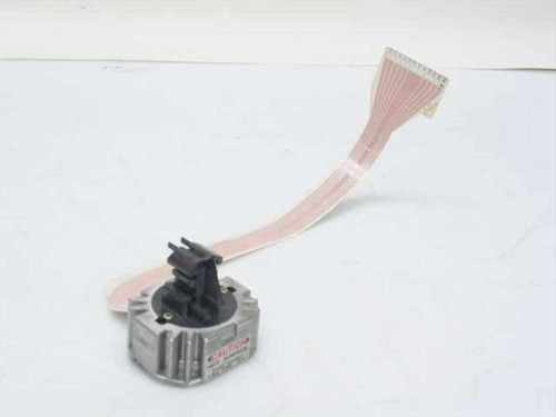 Citizen MSP-10 dot matrix printhead with flat ribbon cable attached — side view showing metal housing and cable connector