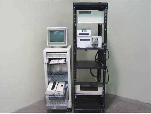 EG&G Princeton Applied Research 1235 spectrograph system overview — full system with HP computer cart and open rack enclosure with peripherals