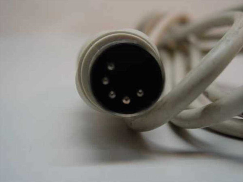 Close-up of 5-pin DIN male connector face showing pin layout on AT keyboard extension cable