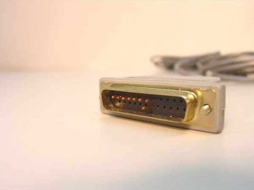 DB25 male connector end of gray serial cable — close-up showing 25-pin plug