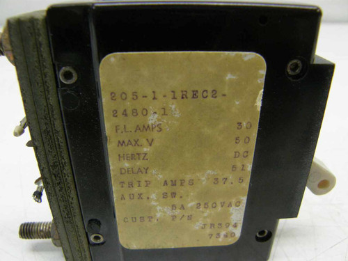Airpax 205-1-11REC2-2480-1 circuit breaker – close-up of rating plate showing 30A, 50V DC, trip 37.5A, aux SW 5A 250VAC specs