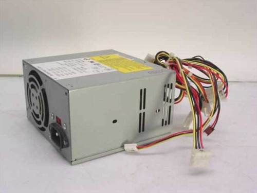 NCR IBM API-3189S AT desktop power supply – front and side view showing fan vent, yellow warning label, and power output cables