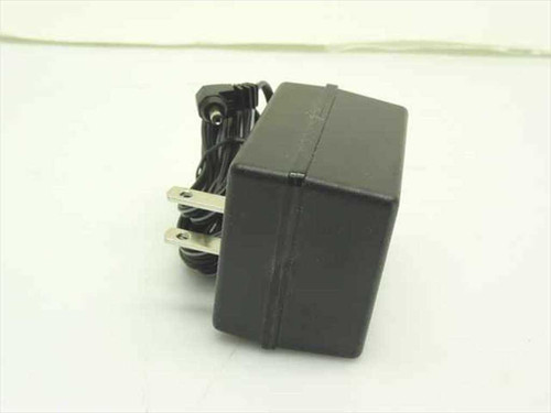 Symbol 50-14000-008 AC adapter for P300 barcode scanner – right side view showing plug prongs and DC output cable