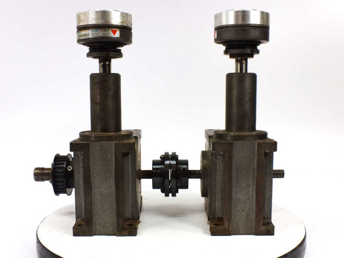 Sandex 7FU rotary indexing drive pair — three-quarter rear view showing adjustment knob, shaft coupling, and gear pinion detail