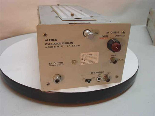 Alfred 653K-S2 Oscillator Plug-In front panel showing RF Output, RF Sampler BNC connectors, Lock knob, and 3.7–8.3 GHz frequency label