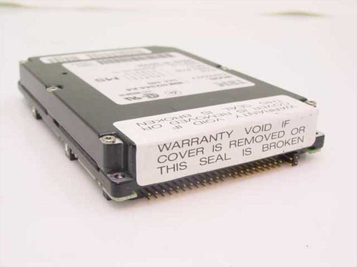 IBM IBM-H2344-A4 344MB 2.5 inch laptop hard drive – angled side view showing IDE connector pins and warranty seal label