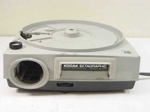 Kodak Ektagraphic B-2AR slide projector front and left side view showing lens port empty and rotary tray