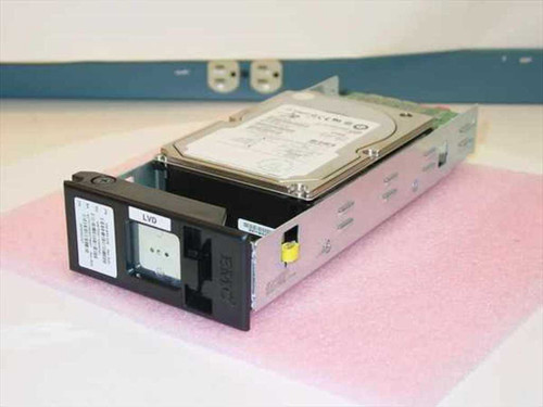 EMC 100-845-228 181GB SCSI hard drive in EMC hot swap carrier, front-left three-quarter view on pink anti-static foam
