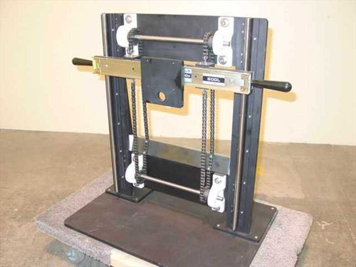 Gravity hoist faceplate mount dual chain counterbalance assembly – front three-quarter view showing THK linear slide, dual roller chains, black steel frame, and handle grips