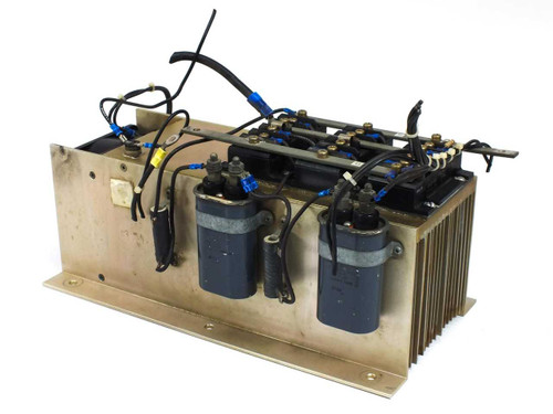 Volkmann M-8010AB heat sink assembly — front three-quarter view showing two GE 26F6769FC motor run capacitors, Fuji EVL31-050 transistor modules, and bus bar wiring on top