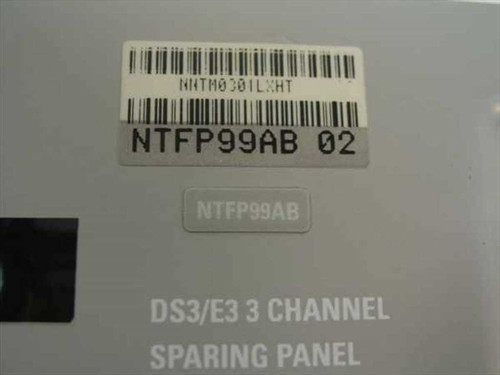Nortel NTFP99AB DS3/E3 3-Channel Sparing Panel – close-up of label showing part number NTFP99AB 02, barcode NNTM0301LXHT, and embossed DS3/E3 3 Channel Sparing Panel text