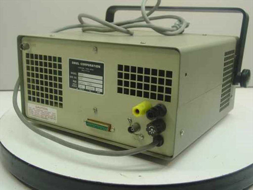 Oriel 7072 Detection System Controller — rear panel showing Oriel Corporation label plate, DB-25 connector, banana jacks, ventilation grille, and AC power cable