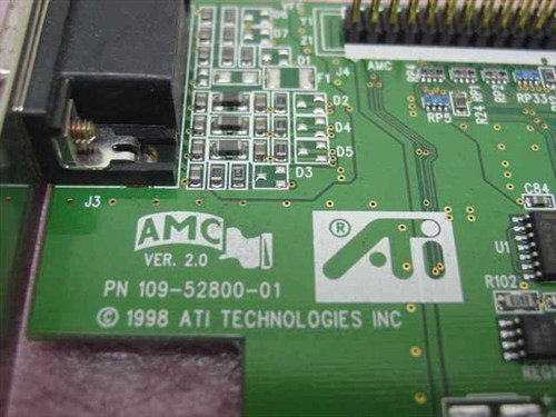 ATI RAGE 2C AGP video card – angled rear view showing VGA DB-15 output connector on bracket and AGP edge connector