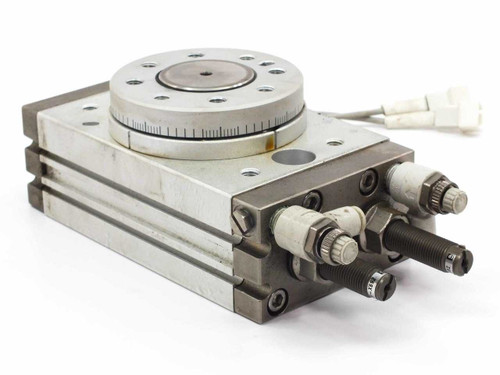 SMC MSQB30R-F9N rotary actuator — three-quarter rear view showing pneumatic ports and adjustment screws
