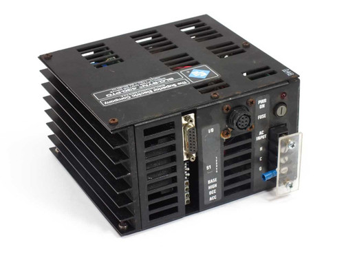 Superior Electric Slo-Syn 430-PTO Oscillator Motor Drive – angled front-right view showing DB-15 I/O port, 8-pin circular connector, DIP switch array, and screw-terminal AC input block