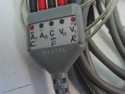 Medtel 114-510 ECG cable junction block close-up showing labeled lead terminals: AT/C, AR, CF, VR, VT/R with Medtel branding