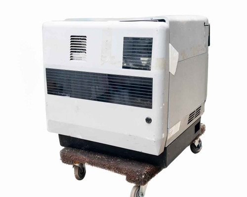 Motorola C25HDM01H7AF Microcite cellular base station cabinet on casters — left-side and rear view showing ventilation louvers and tape residue
