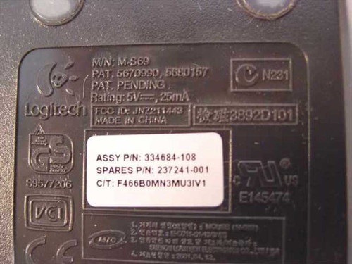 Logitech M-S69 mouse bottom label showing M/N M-S69, Spares P/N 237241-001, Assy P/N 334684-108, 5V 25mA rating, FCC ID JNZ2211443, Made in China